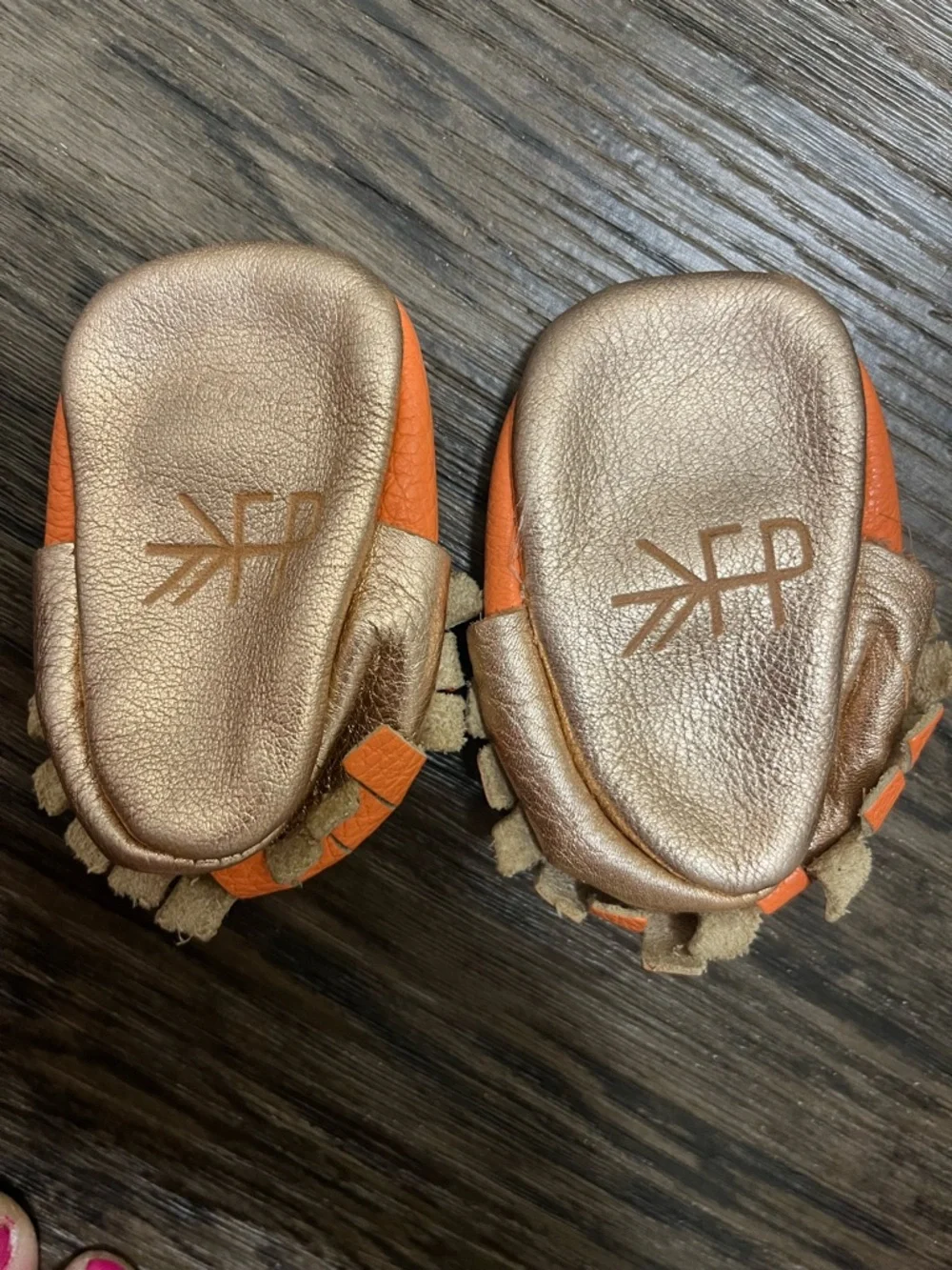 Freshly Picked electric coral Fringe Moccasins - Baby Shoes